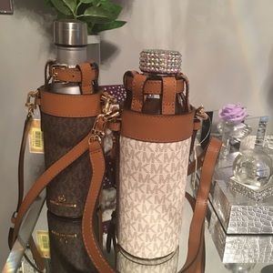 Michael Kors vanilla and brown water bottle logo